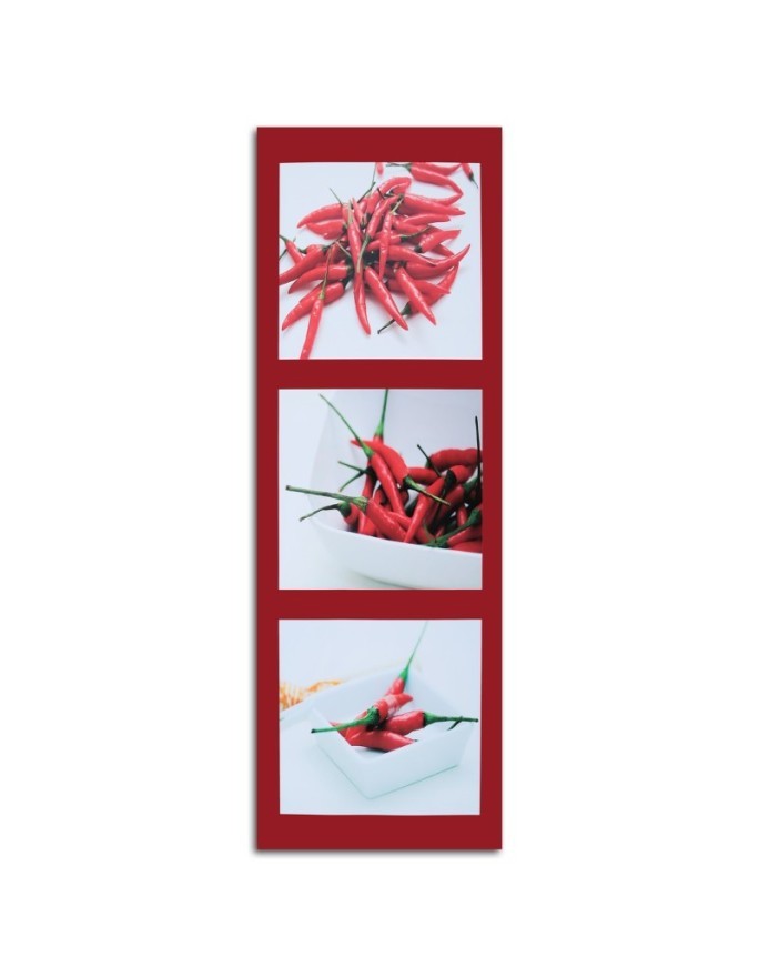 Canvas print - Red chilli peppers on a red background | FEEBY